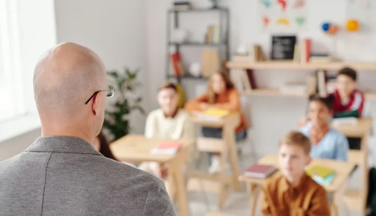 Teacher leading a classroom discussion